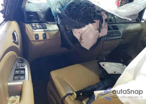 2010 Honda Odyssey Exl z USA, uszkodzony, nr VIN 5FNRL3H60AB037657